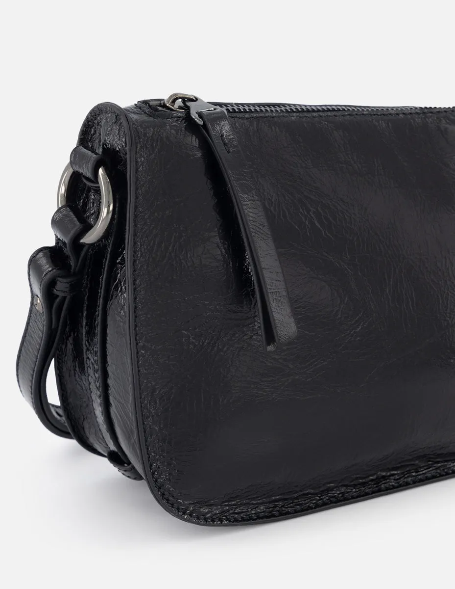 Bolso bandolera asimétrico de charol en color negro para mujer