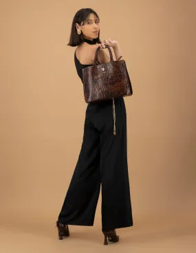 Bolso de mano de piel grabado tipo coco color caoba para mujer