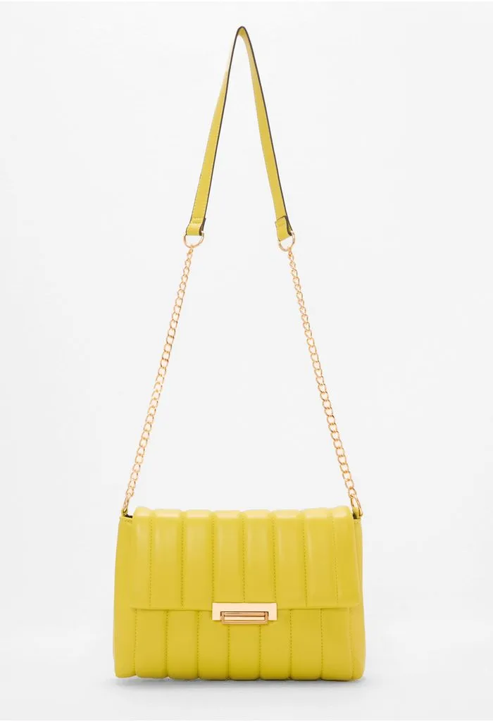 Bolso manos libres acolchado con herraje unic verdelima